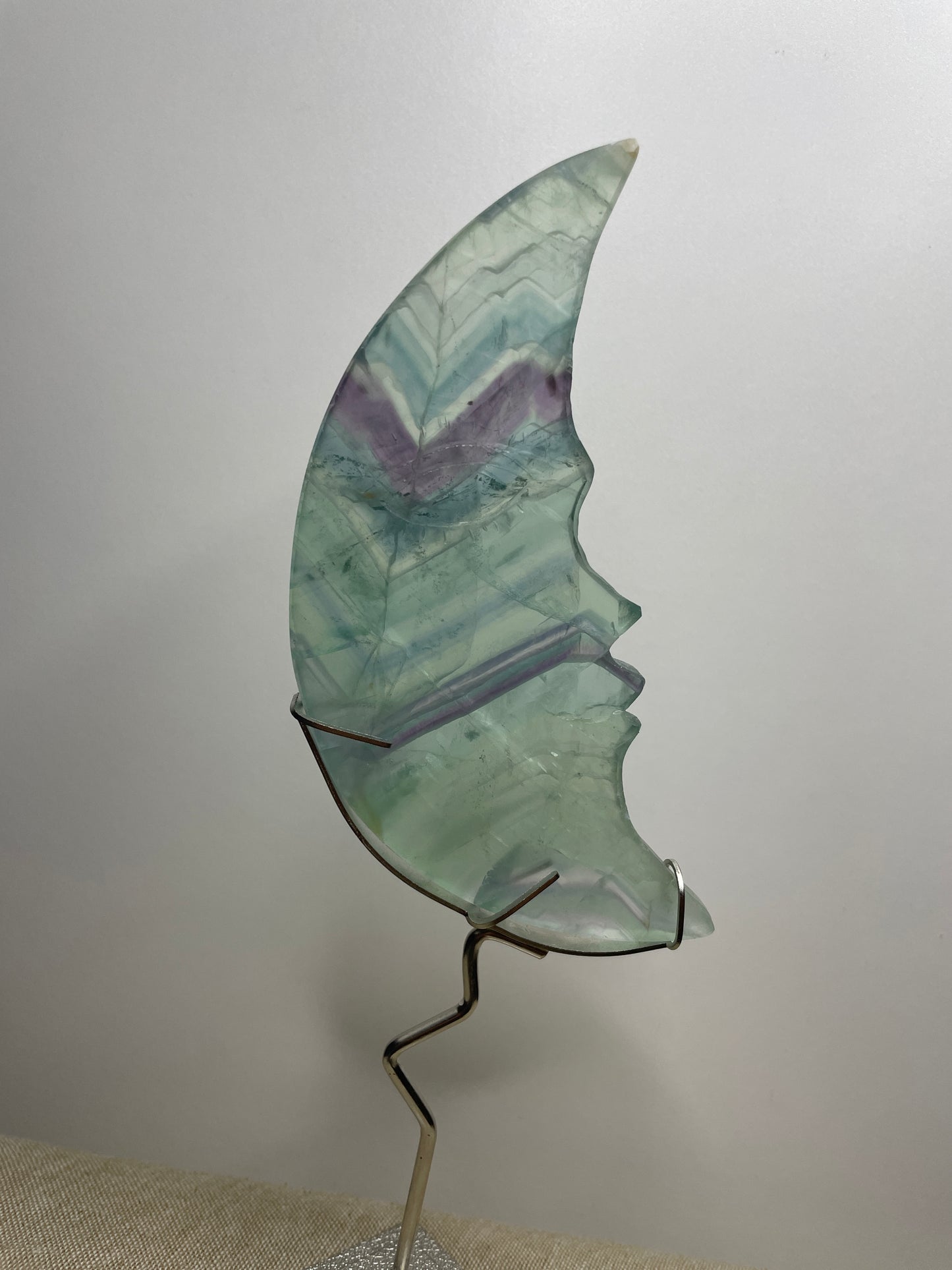 Fluorite moon carving on stand