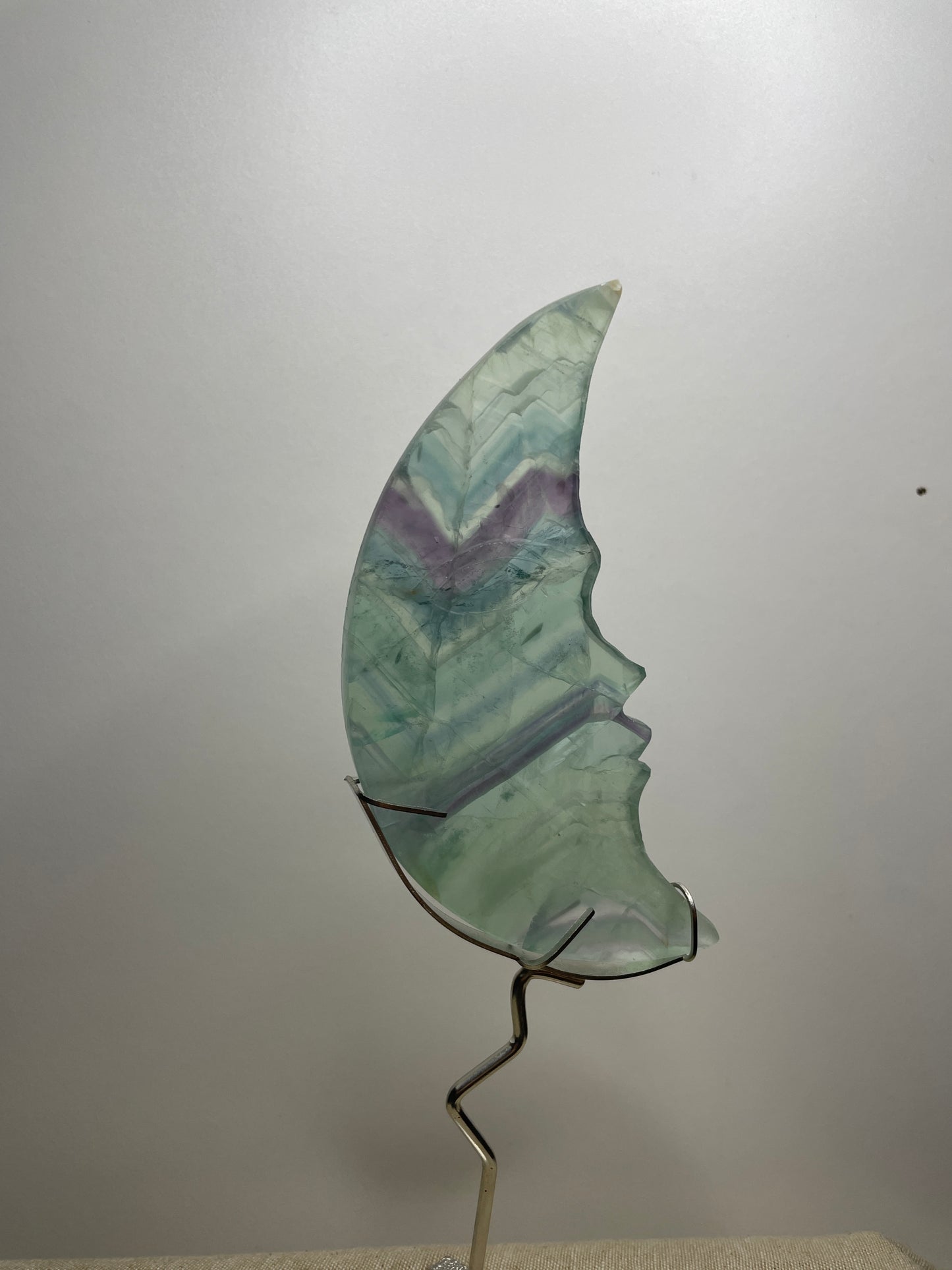 Fluorite moon carving on stand