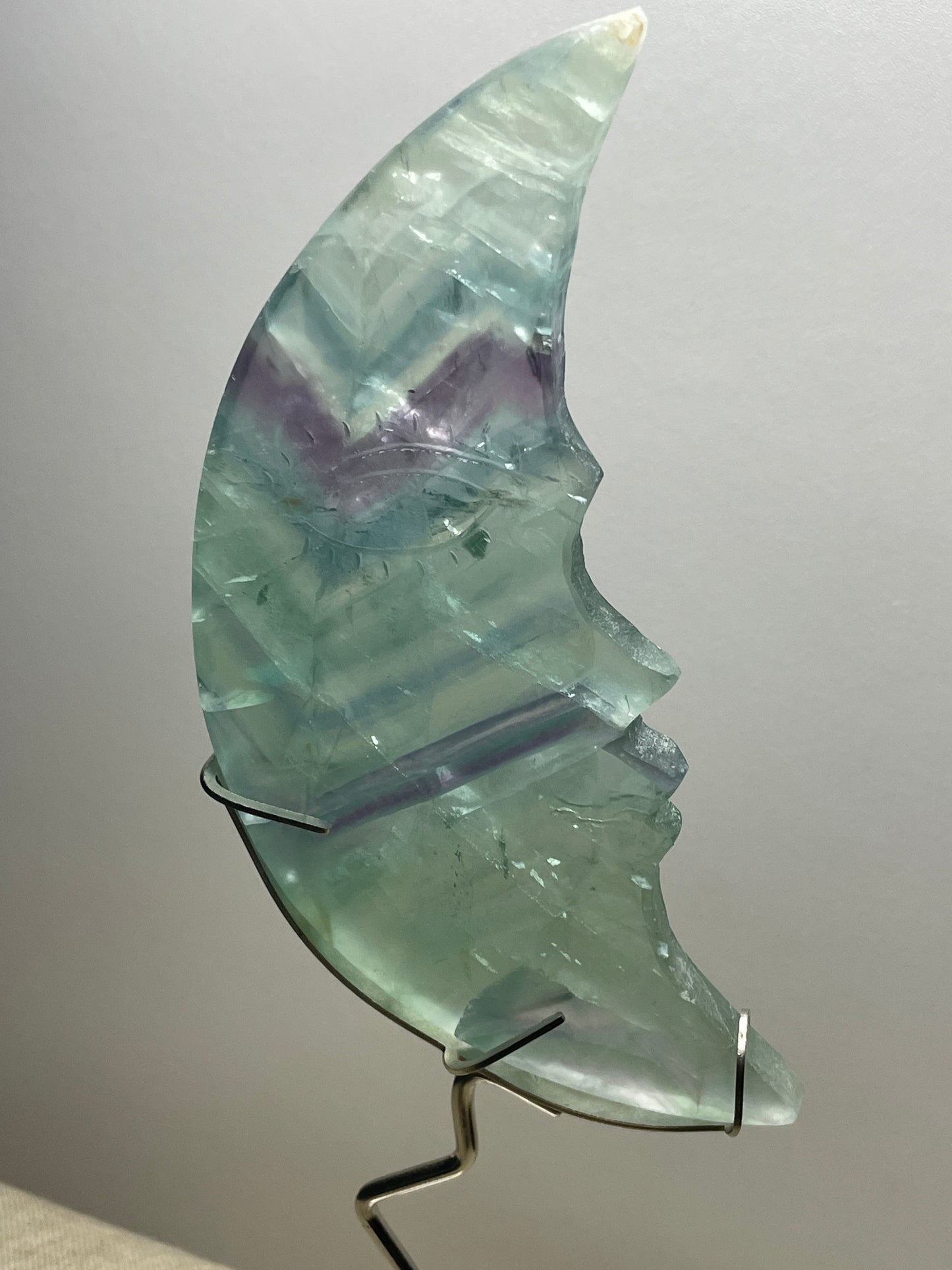 Fluorite moon carving on stand