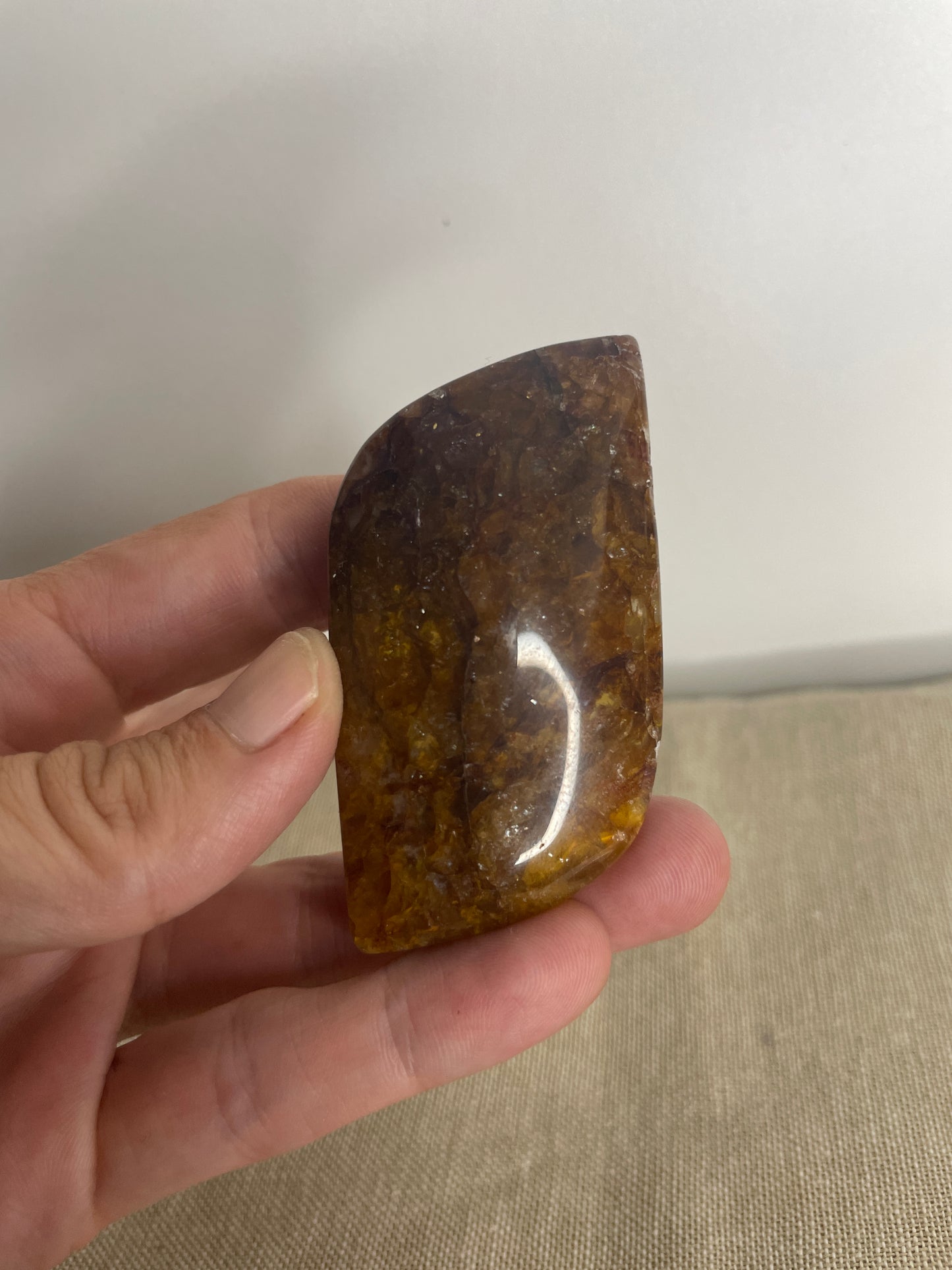 Golden healer leaf palm stone