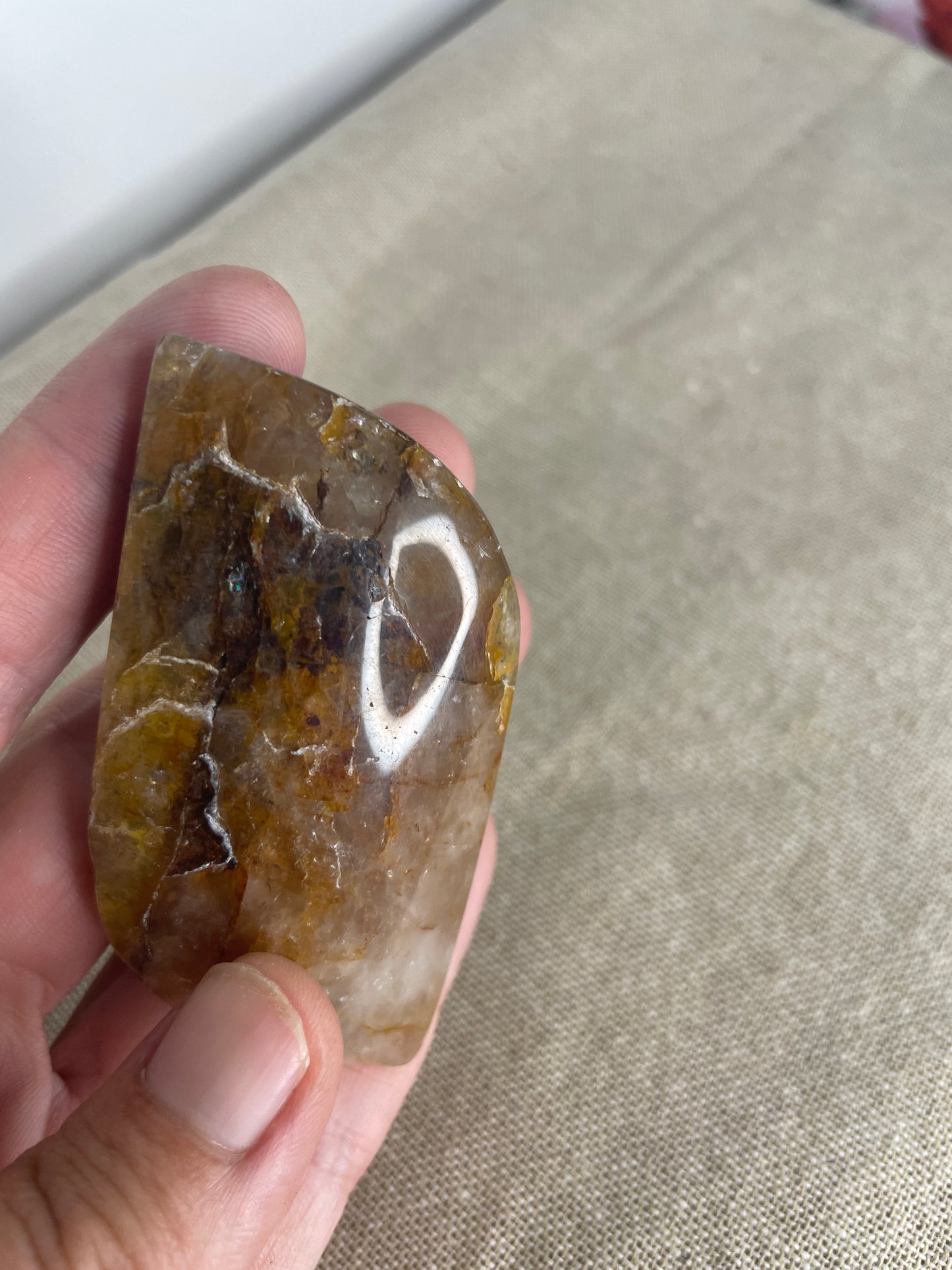 Golden healer leaf palm stone