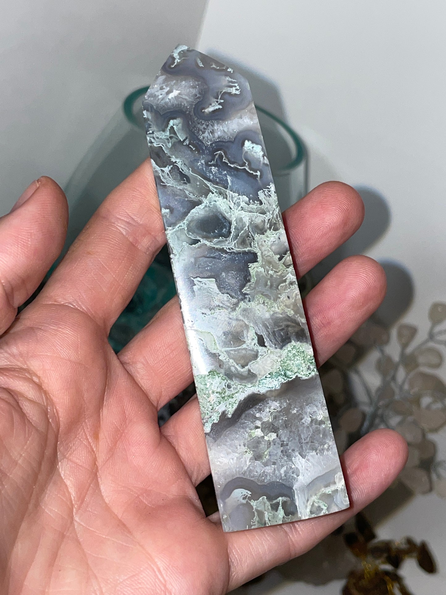 Moss agate tower with vugs