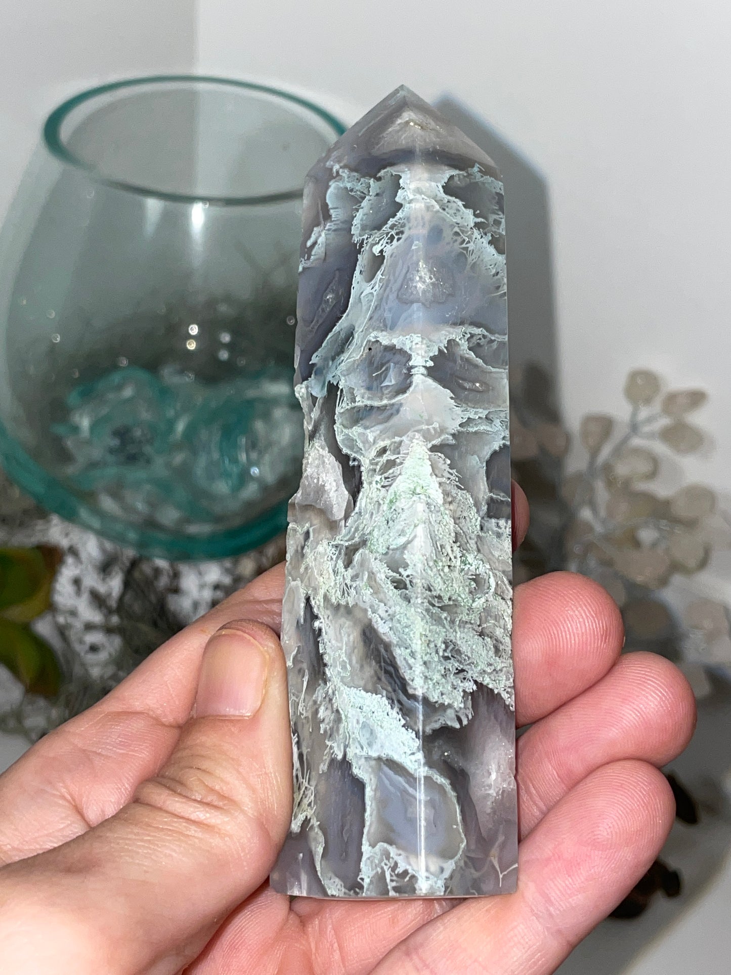 Moss agate tower with vugs