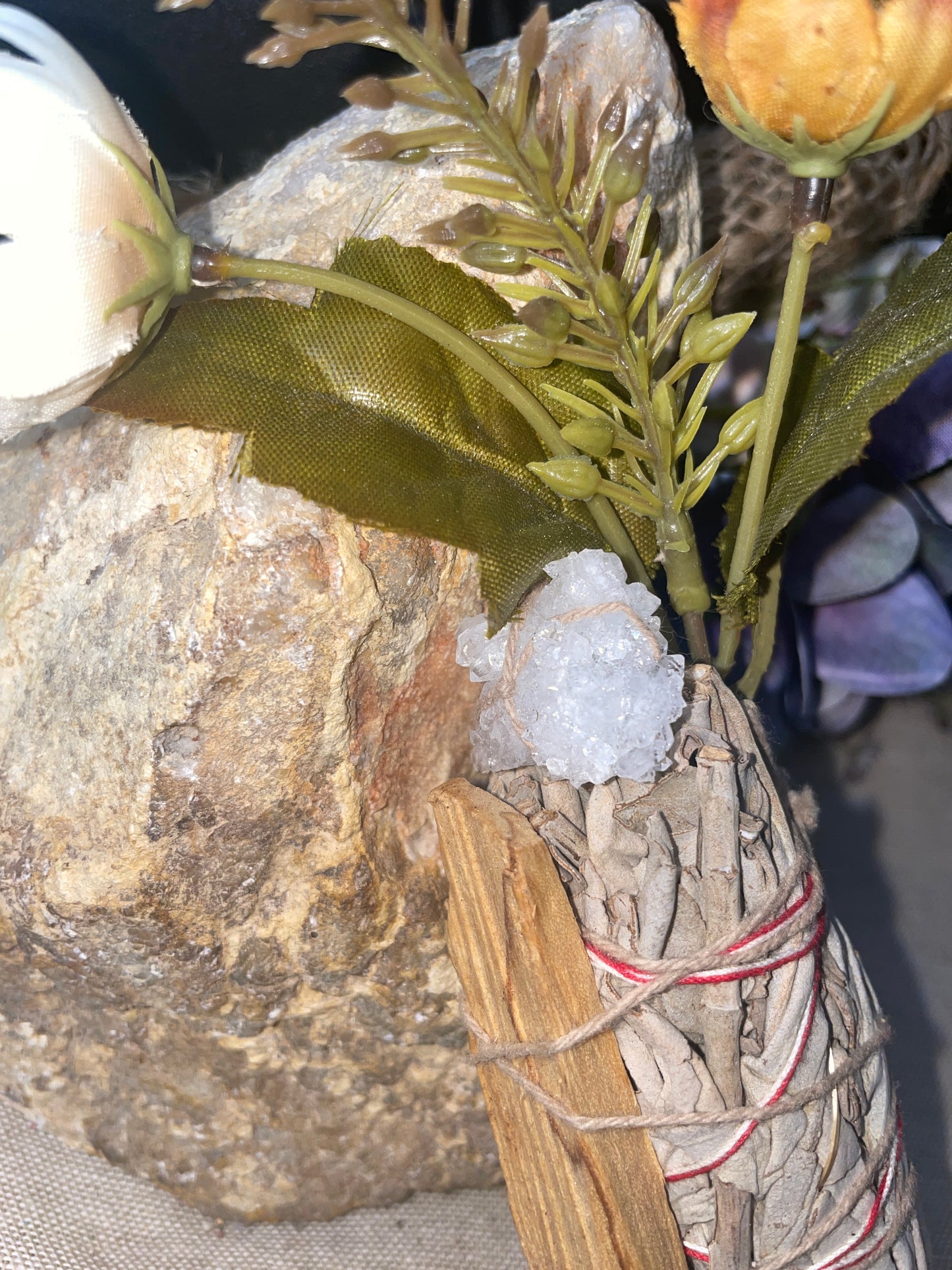 White sage and palo santo smudge wand with quartz cluster