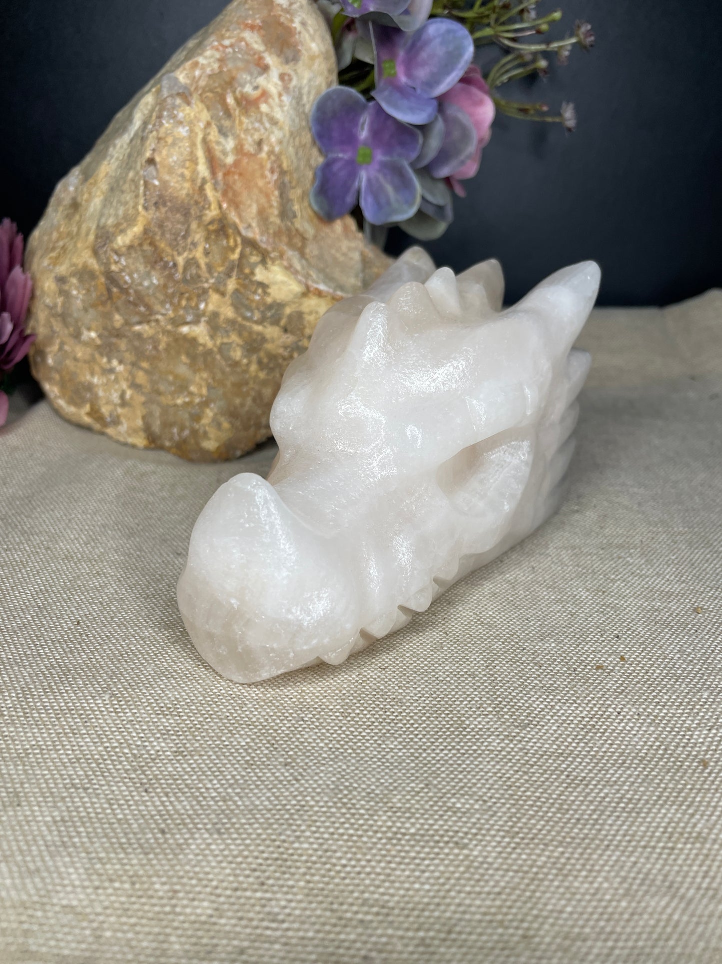 Calcite dragon head carving