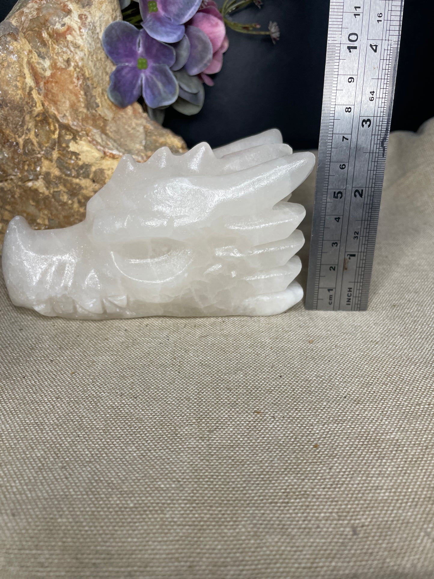 Calcite dragon head carving