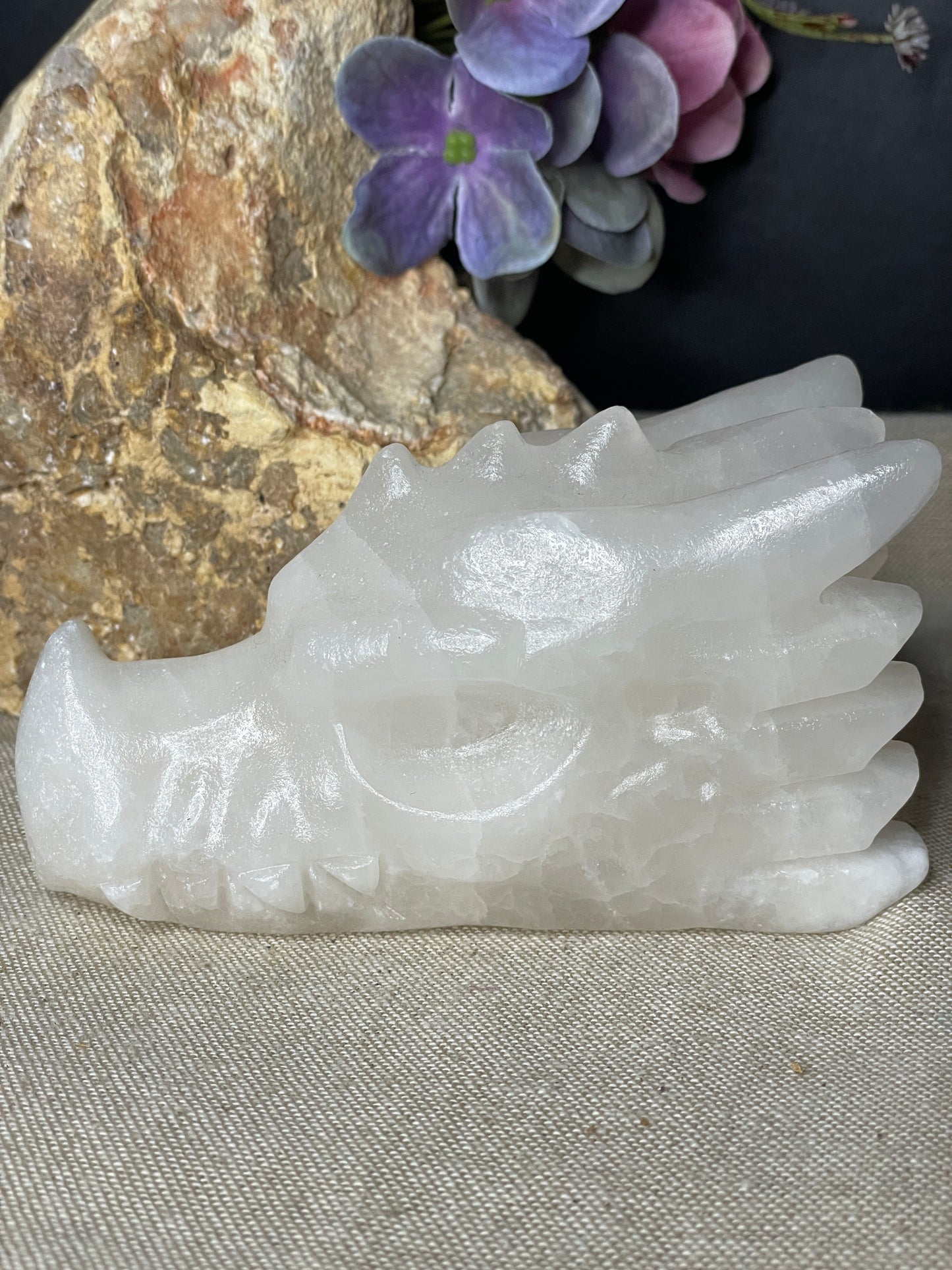 Calcite dragon head carving