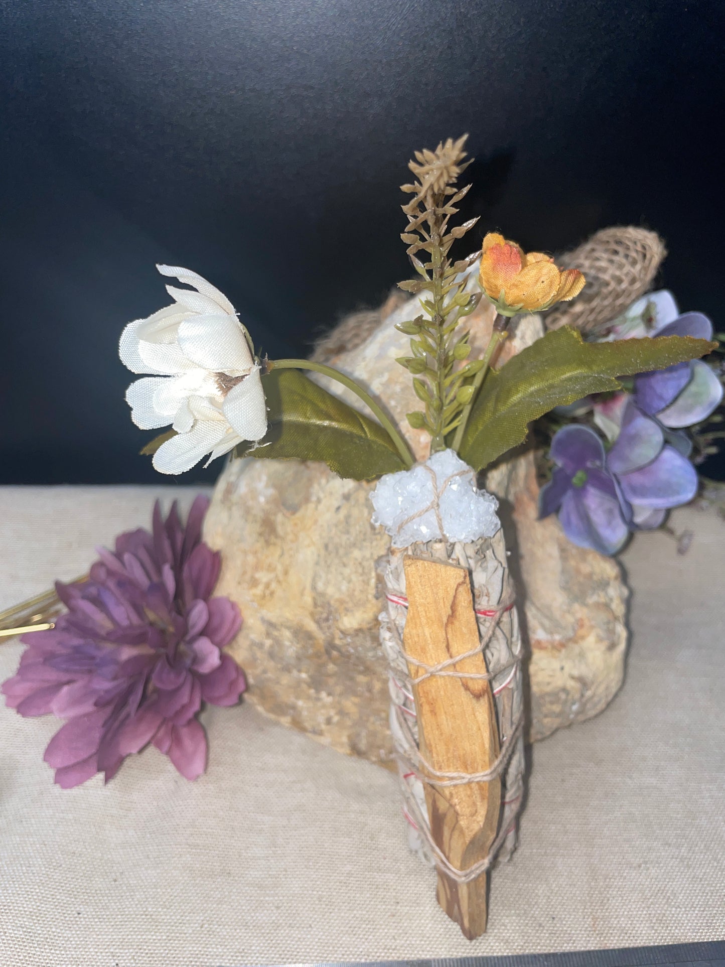 White sage and palo santo smudge wand with quartz cluster