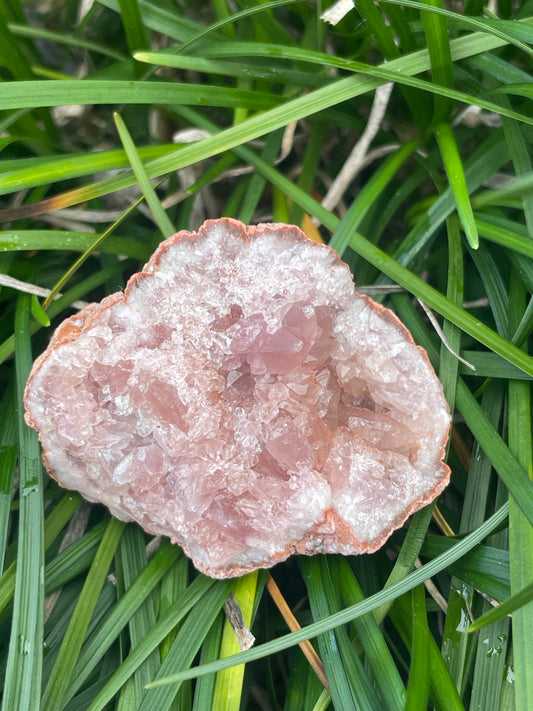 Pink amethyst geode half
