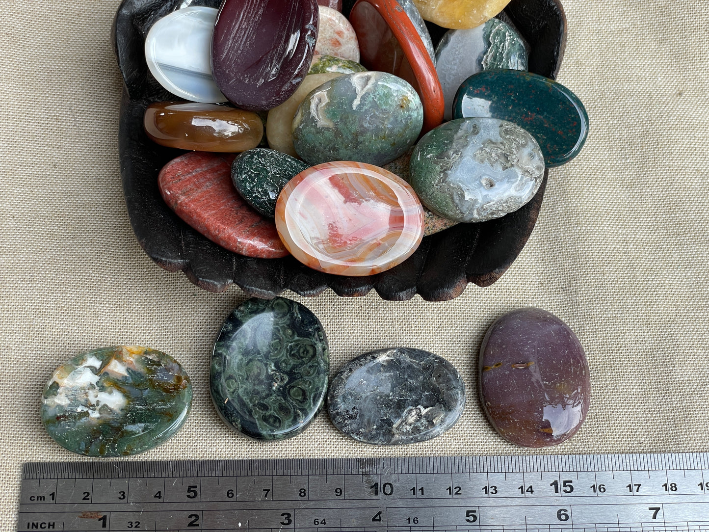 Oval carved stone. Thumb stone