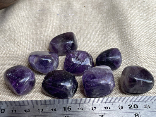 Dark amethyst tumbles