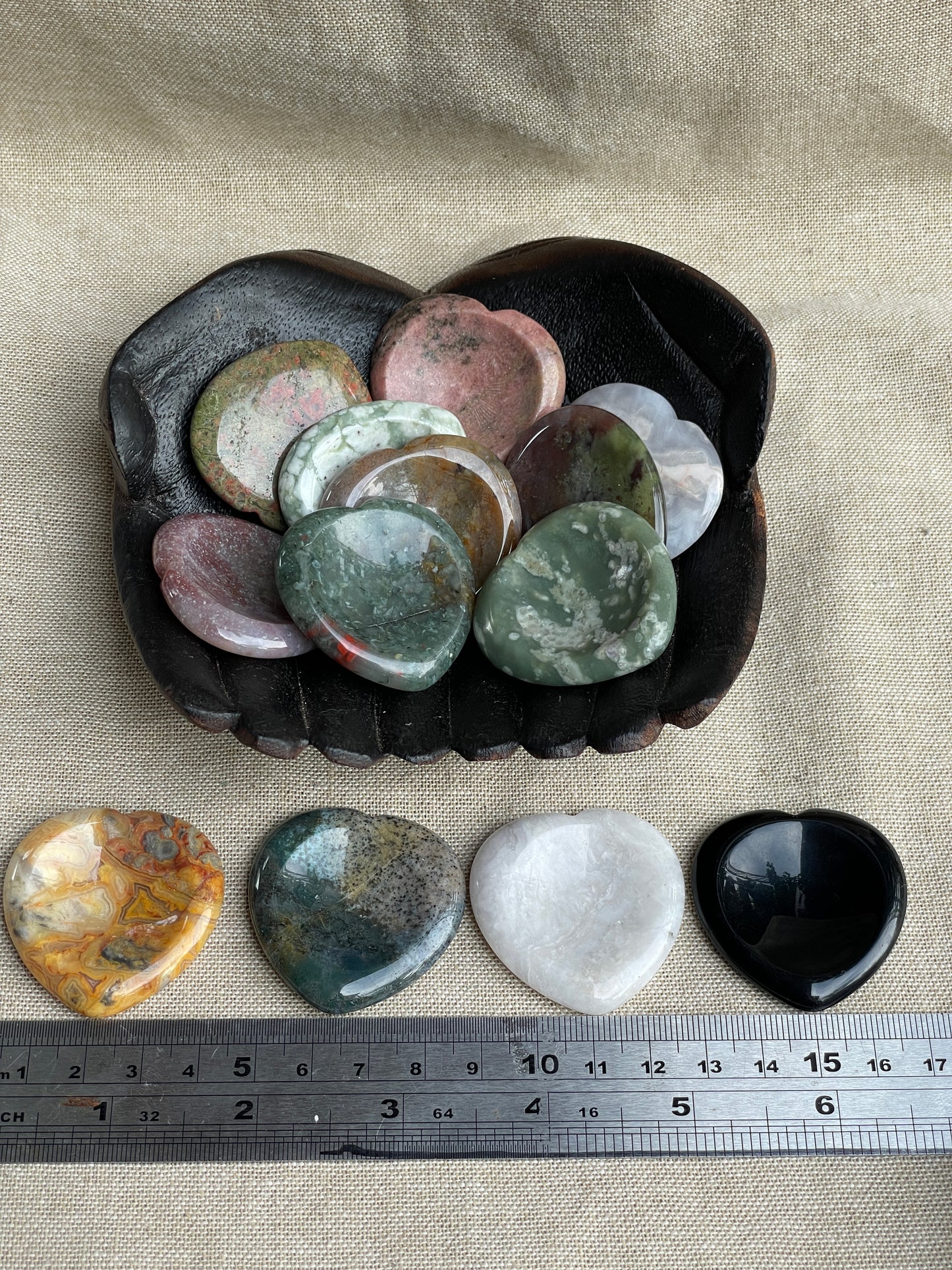 Heart carved assorted stone. Thumb stone