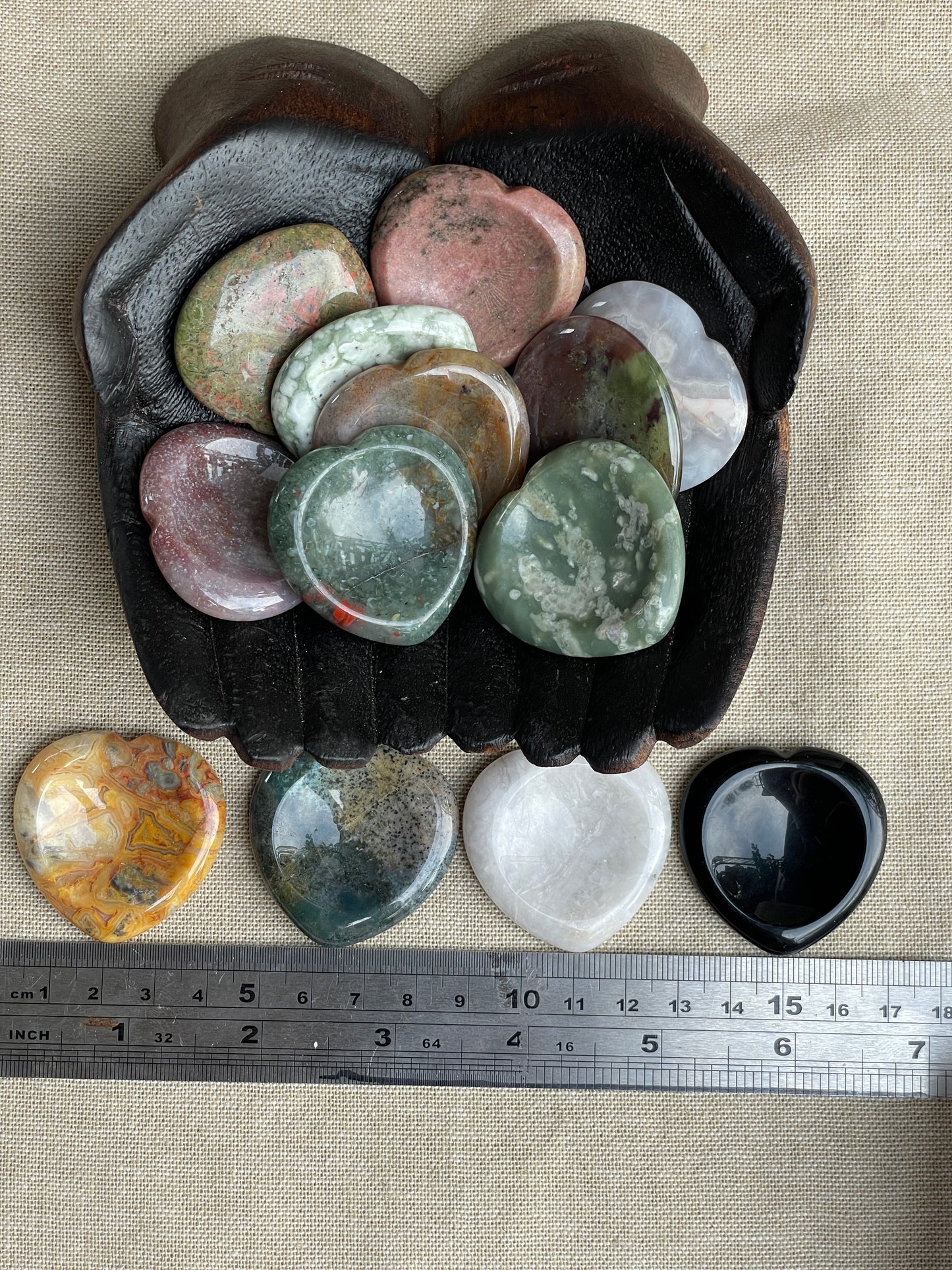 Heart carved assorted stone. Thumb stone