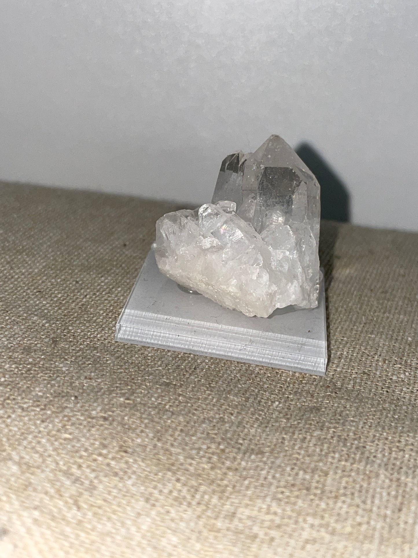 Clear quartz point cluster mounted