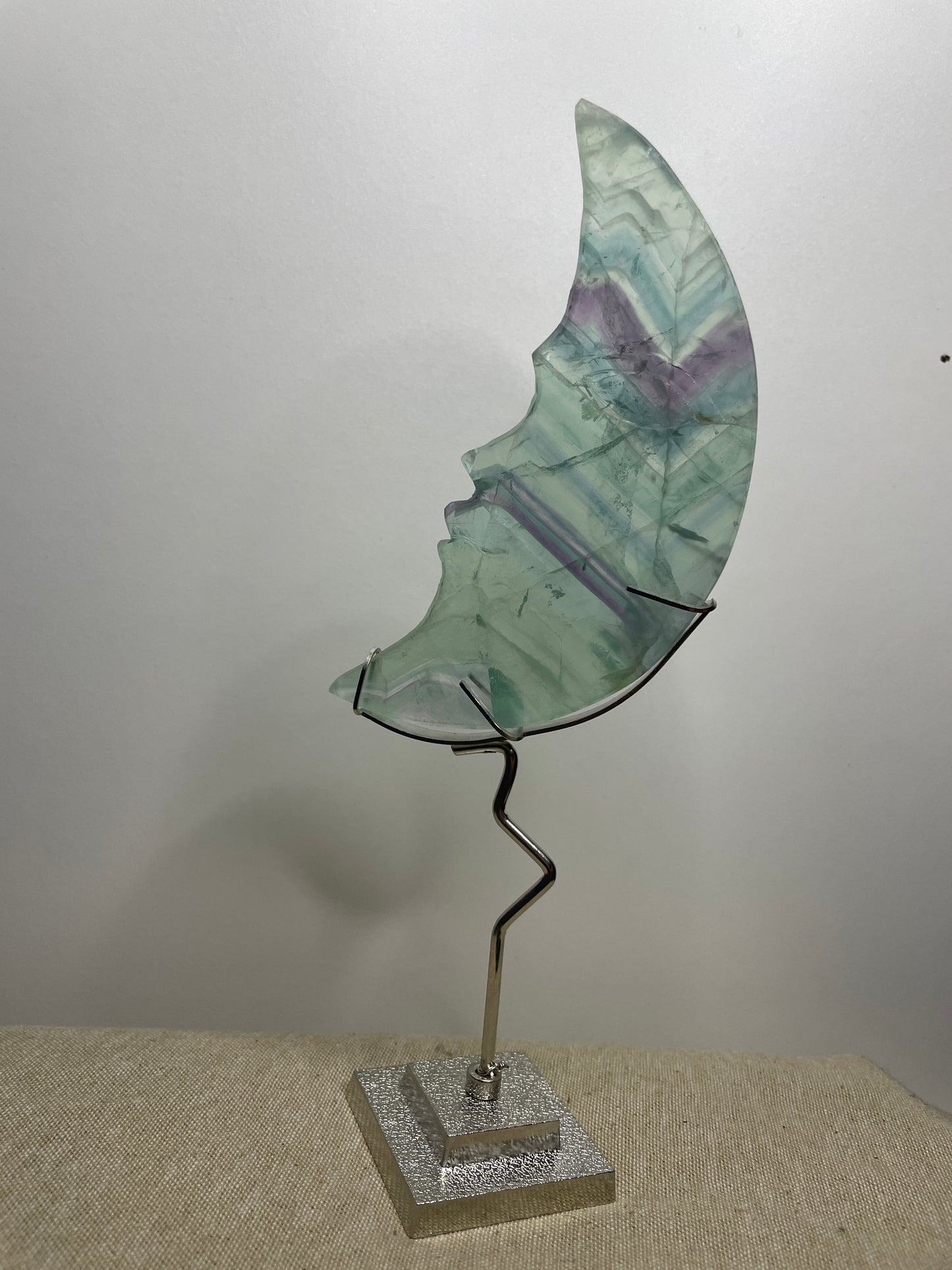 Fluorite moon carving on stand