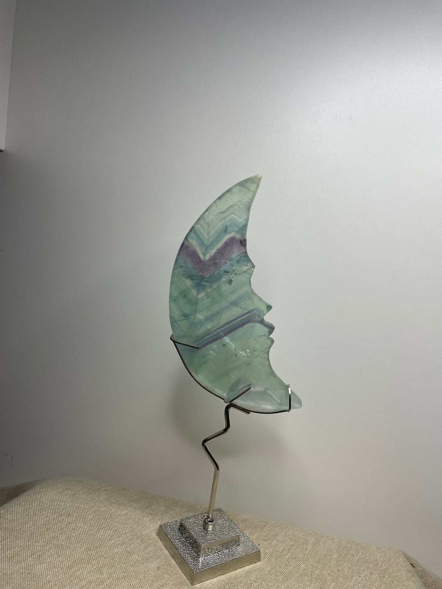 Fluorite moon carving on stand