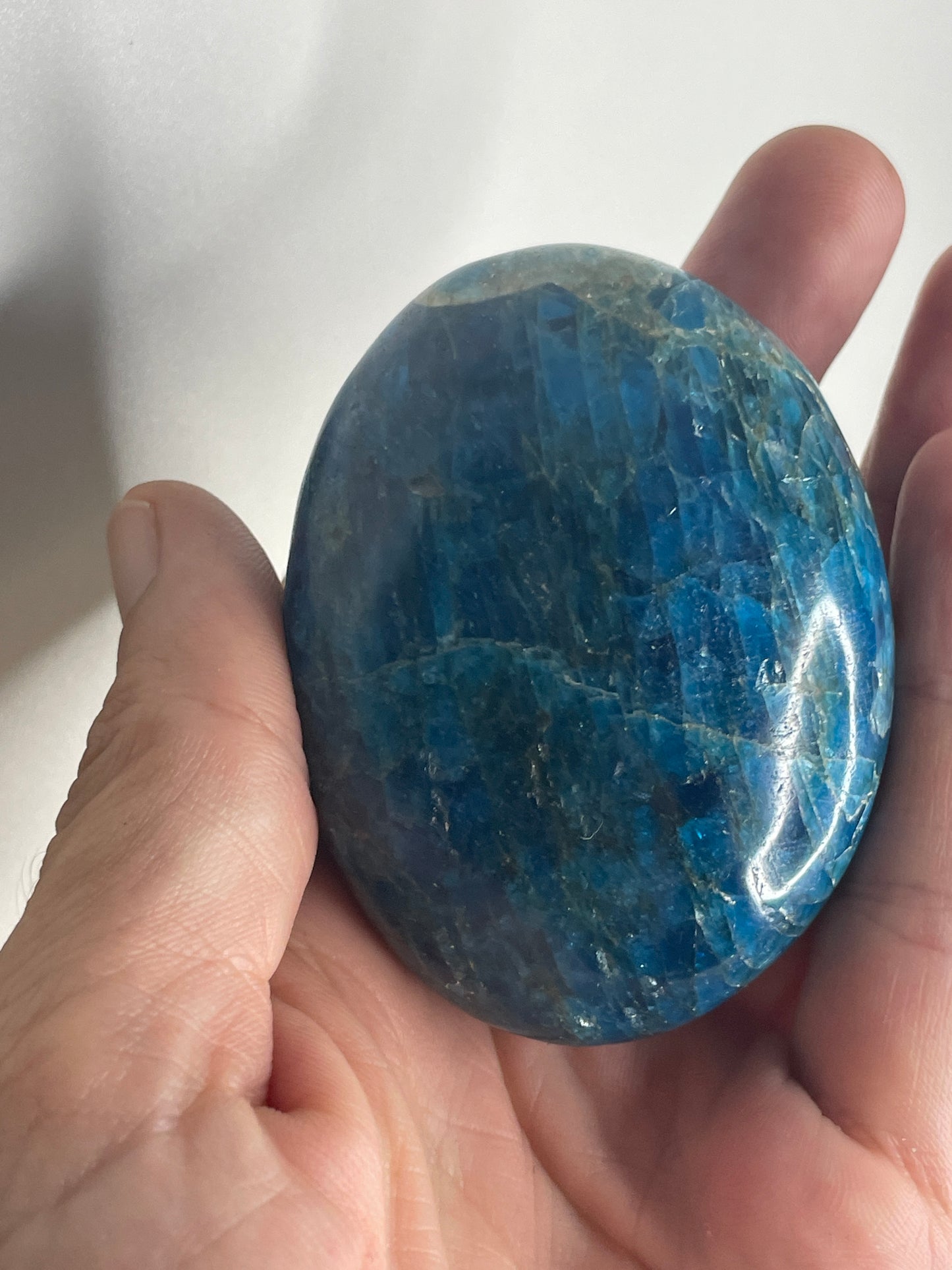 Apatite palm stone