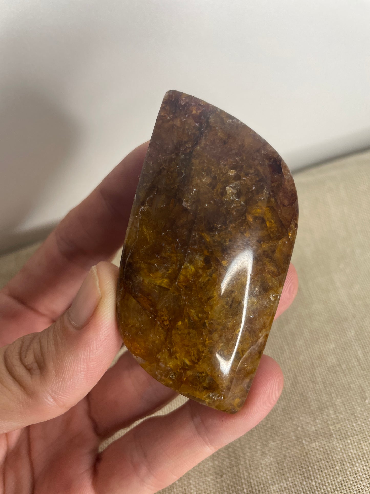 Golden healer leaf palm stone