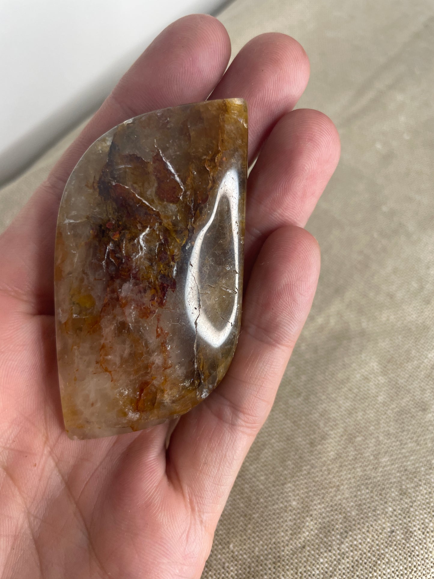 Golden healer leaf palm stone