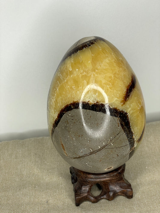 Septarian egg with yellow calcite