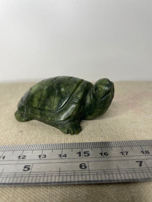 Grumpy serpentine turtle carving