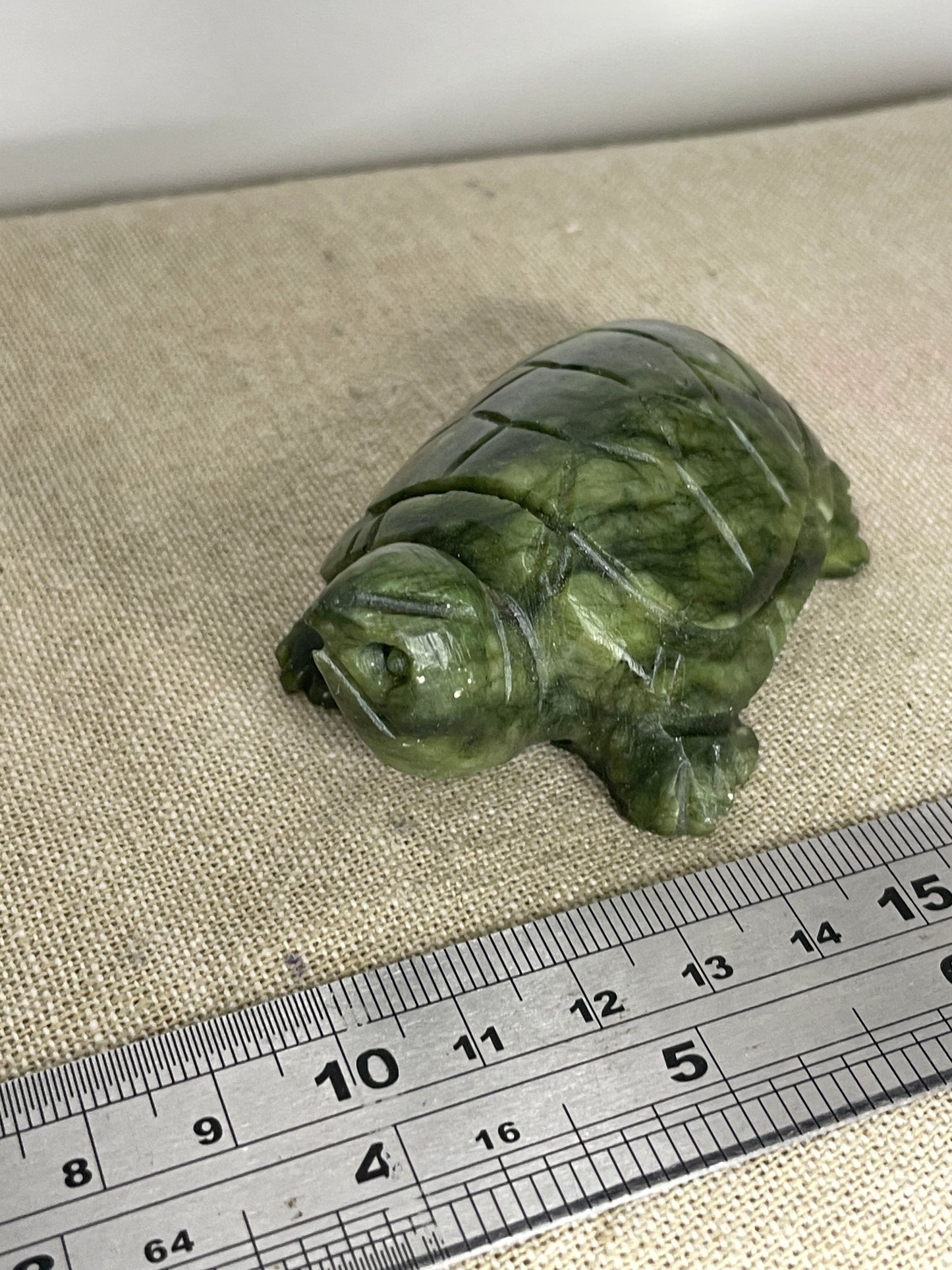 Grumpy serpentine turtle carving