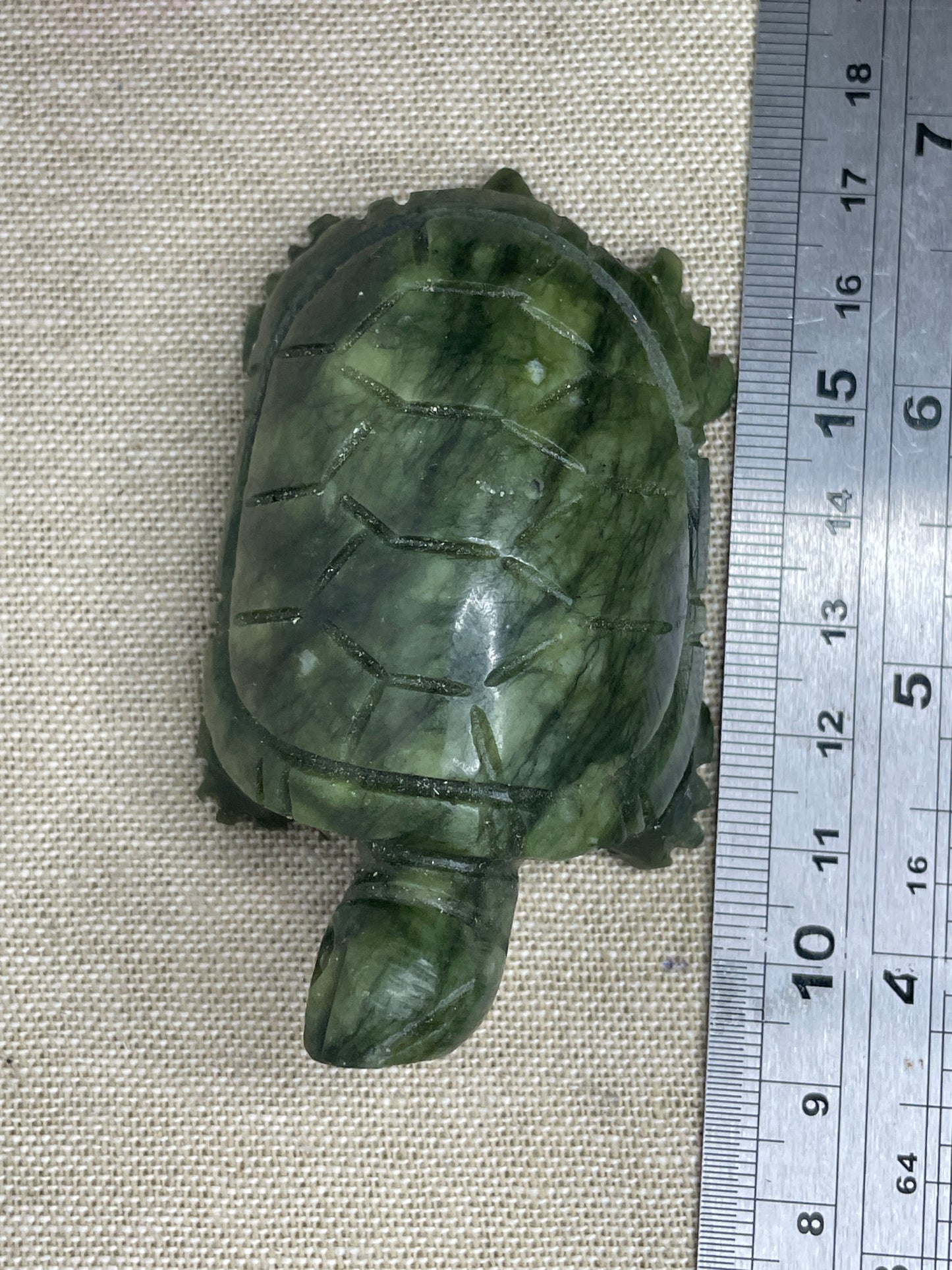 Grumpy serpentine turtle carving