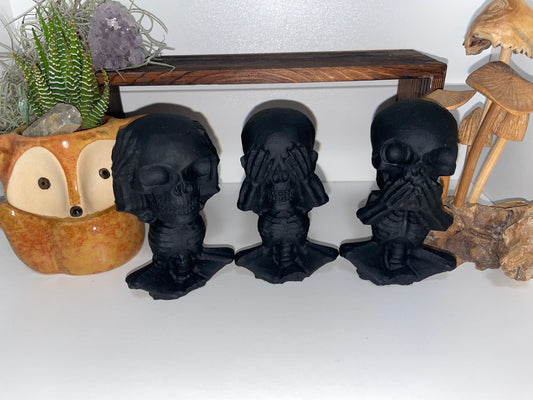 Hear no, see no, speak no evil obsidian carving