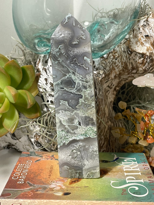 Moss agate tower with vugs