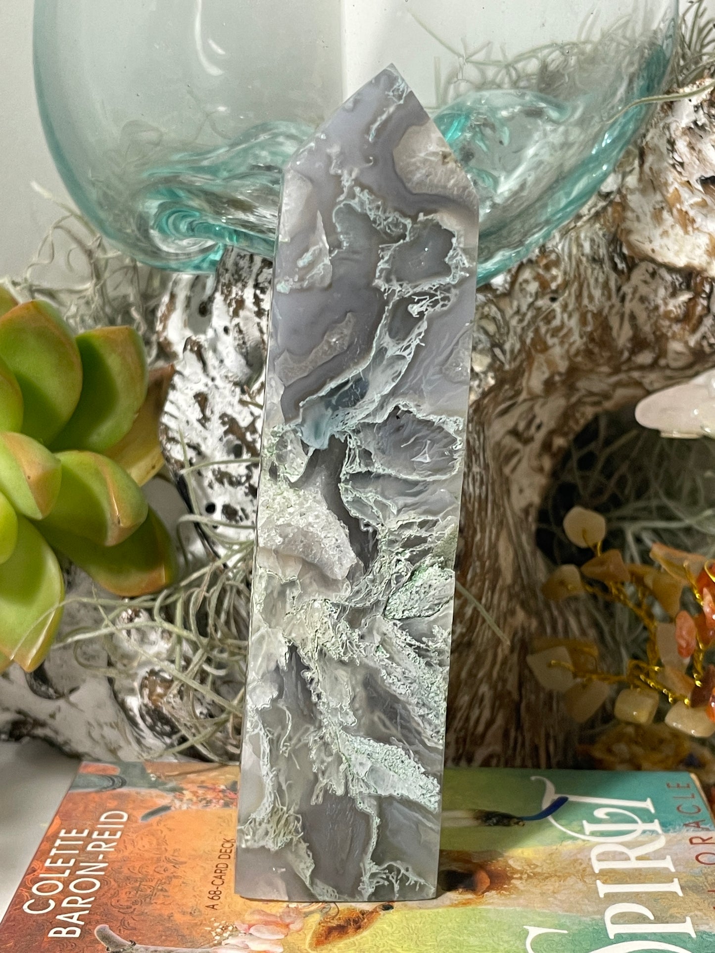 Moss agate tower with vugs