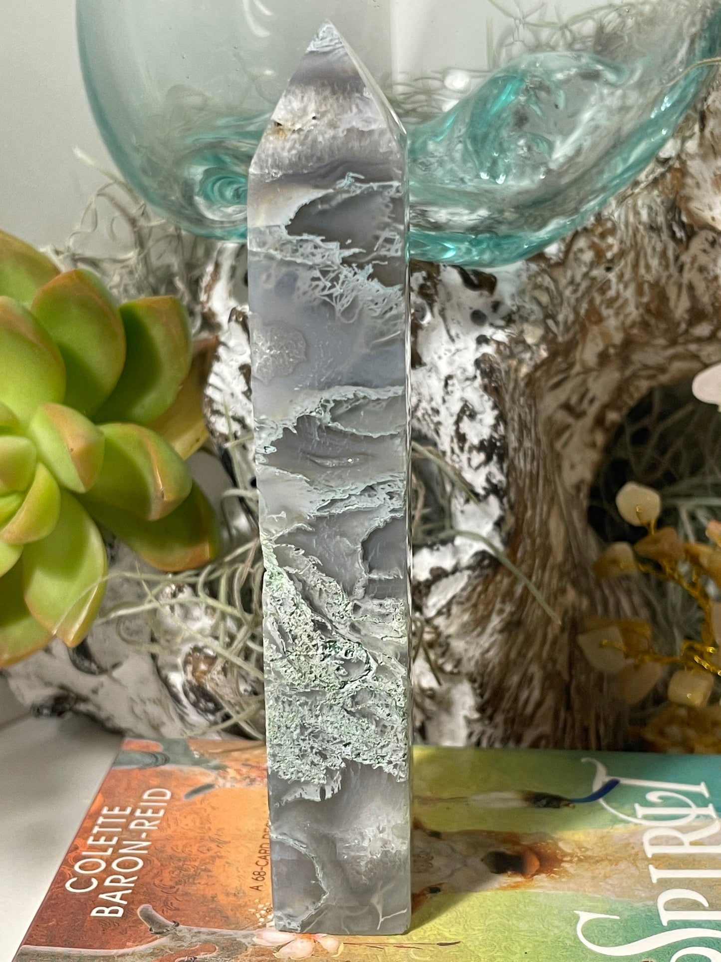 Moss agate tower with vugs