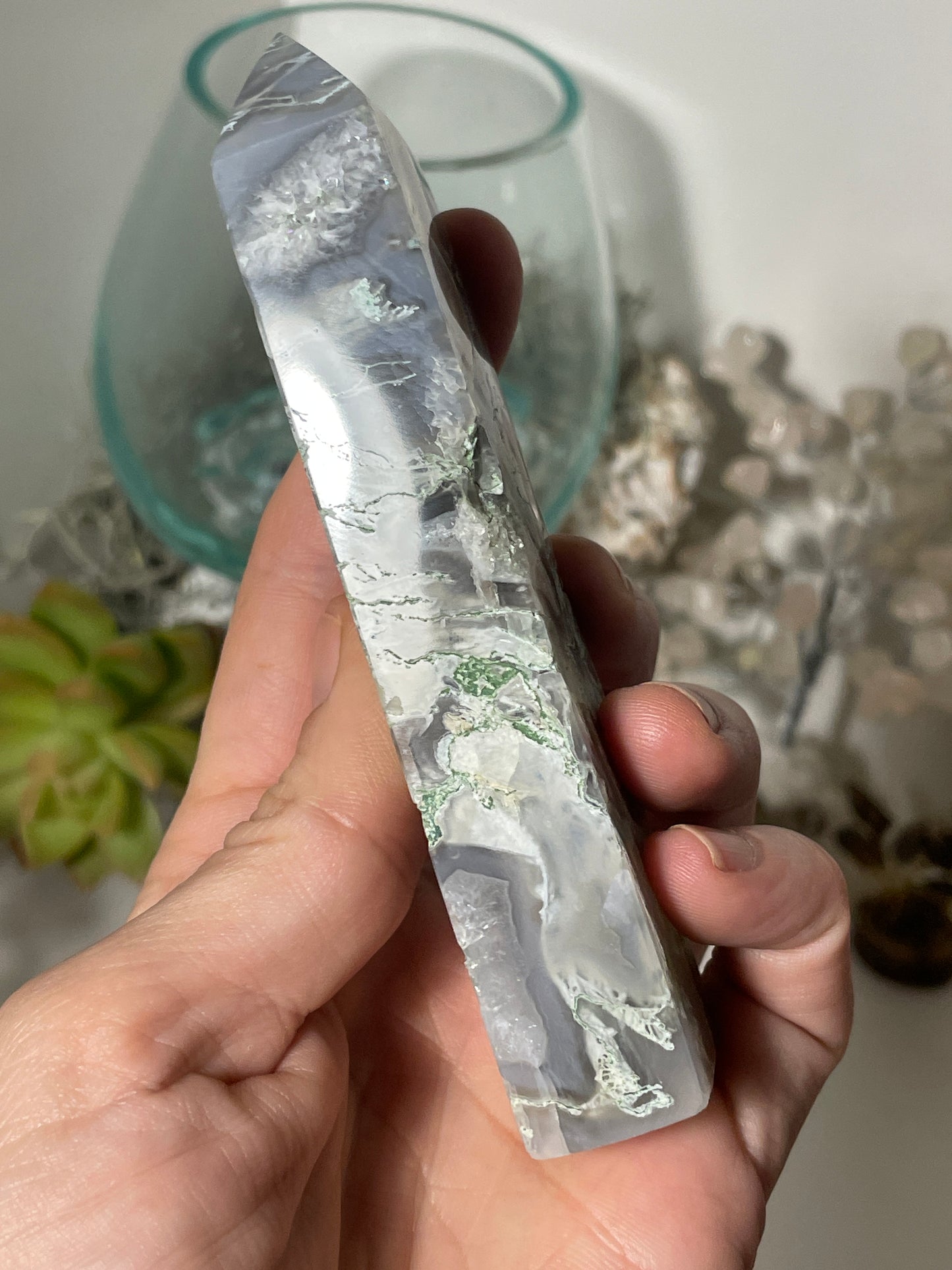 Moss agate tower with vugs
