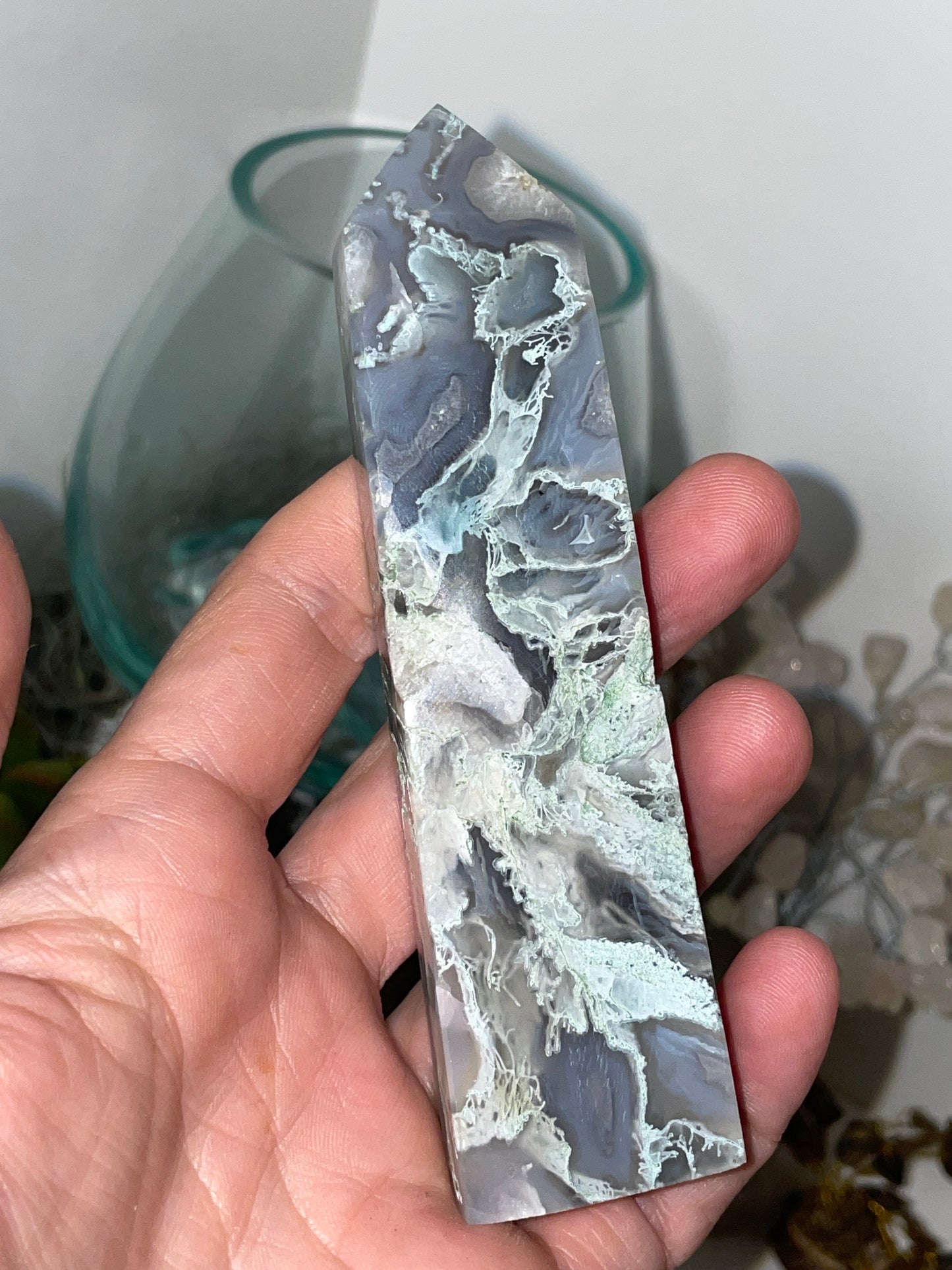 Moss agate tower with vugs